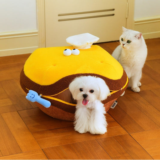 Dog and cat beside the Chef Tart covered bed