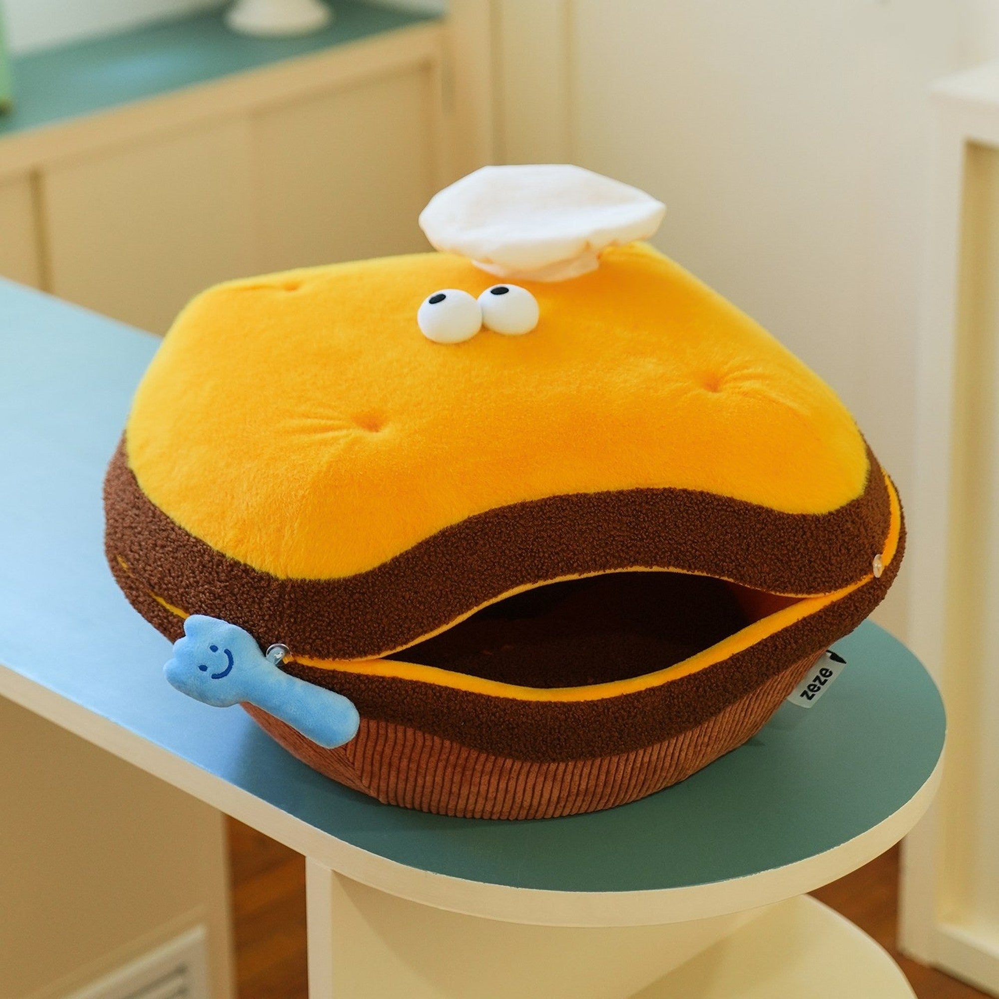 Chef Tart covered pet bed on a side table