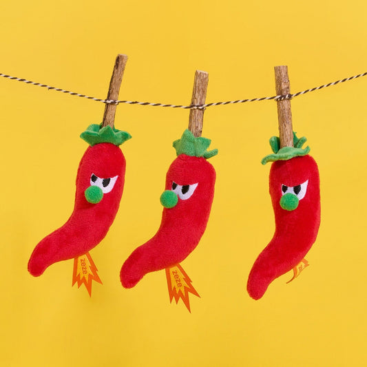 Three Hot Chili cat toys hanging by their silvervine sticks