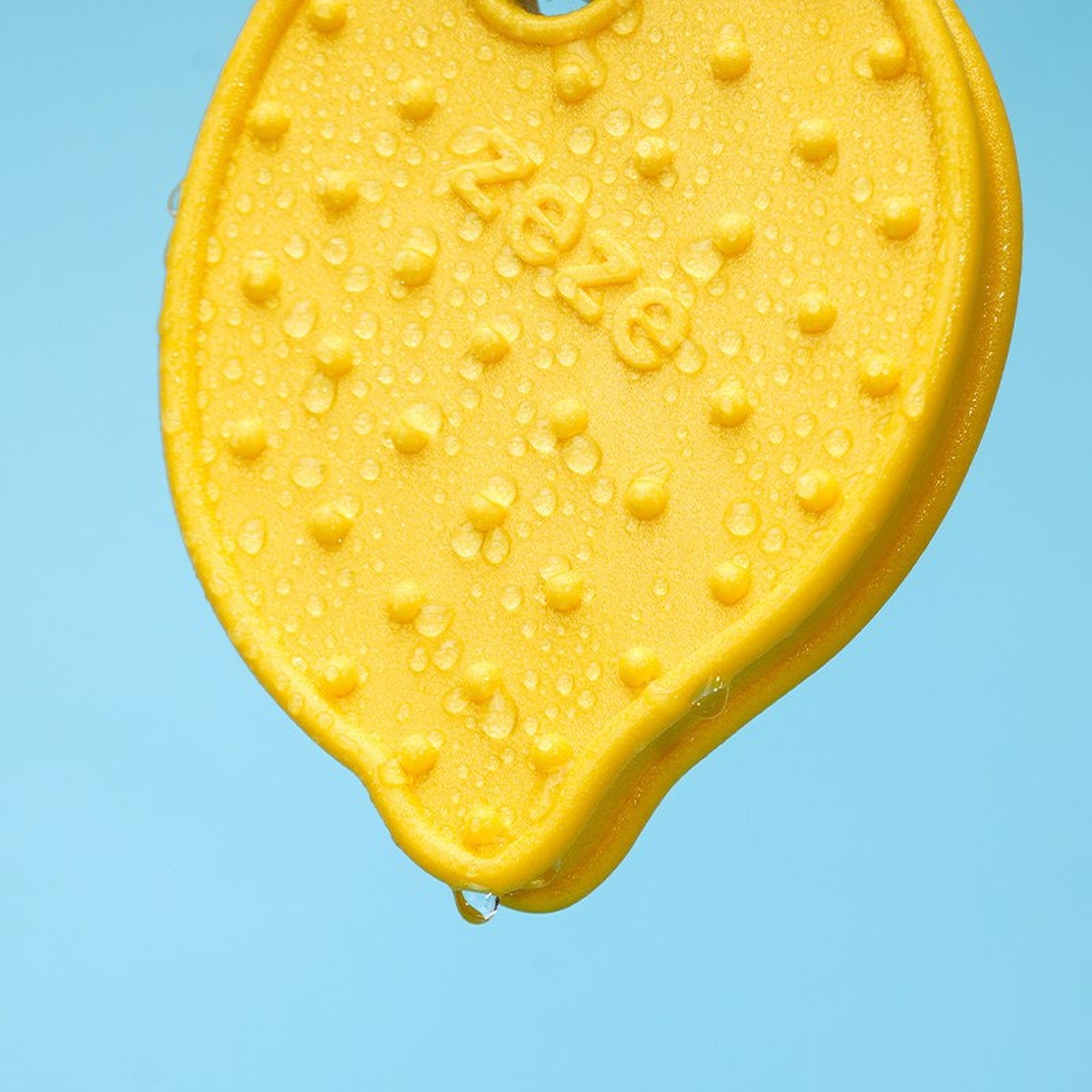 Close-up of the raised nub texture on the lemon chew