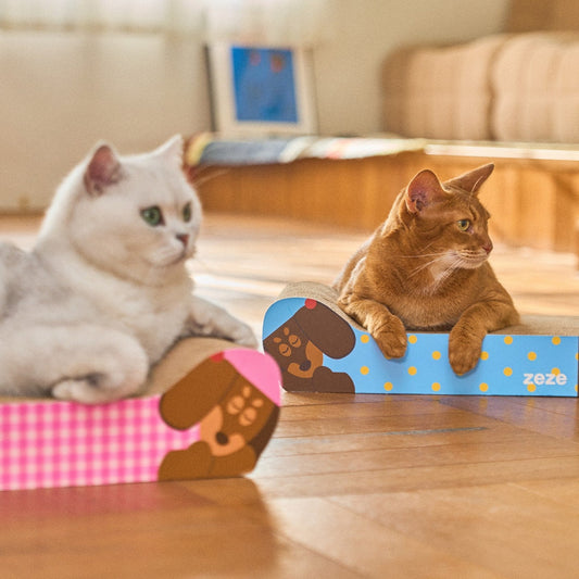 Two cats lounging on ZEZE Monica dachshund cat scratchers