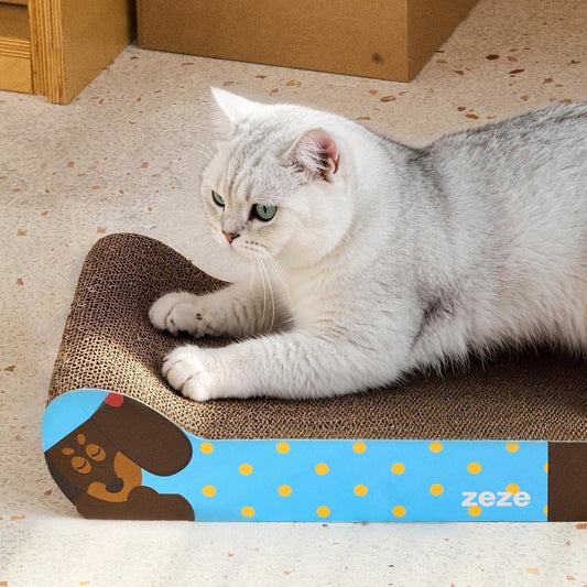 Cat scratching the blue Monica lounger