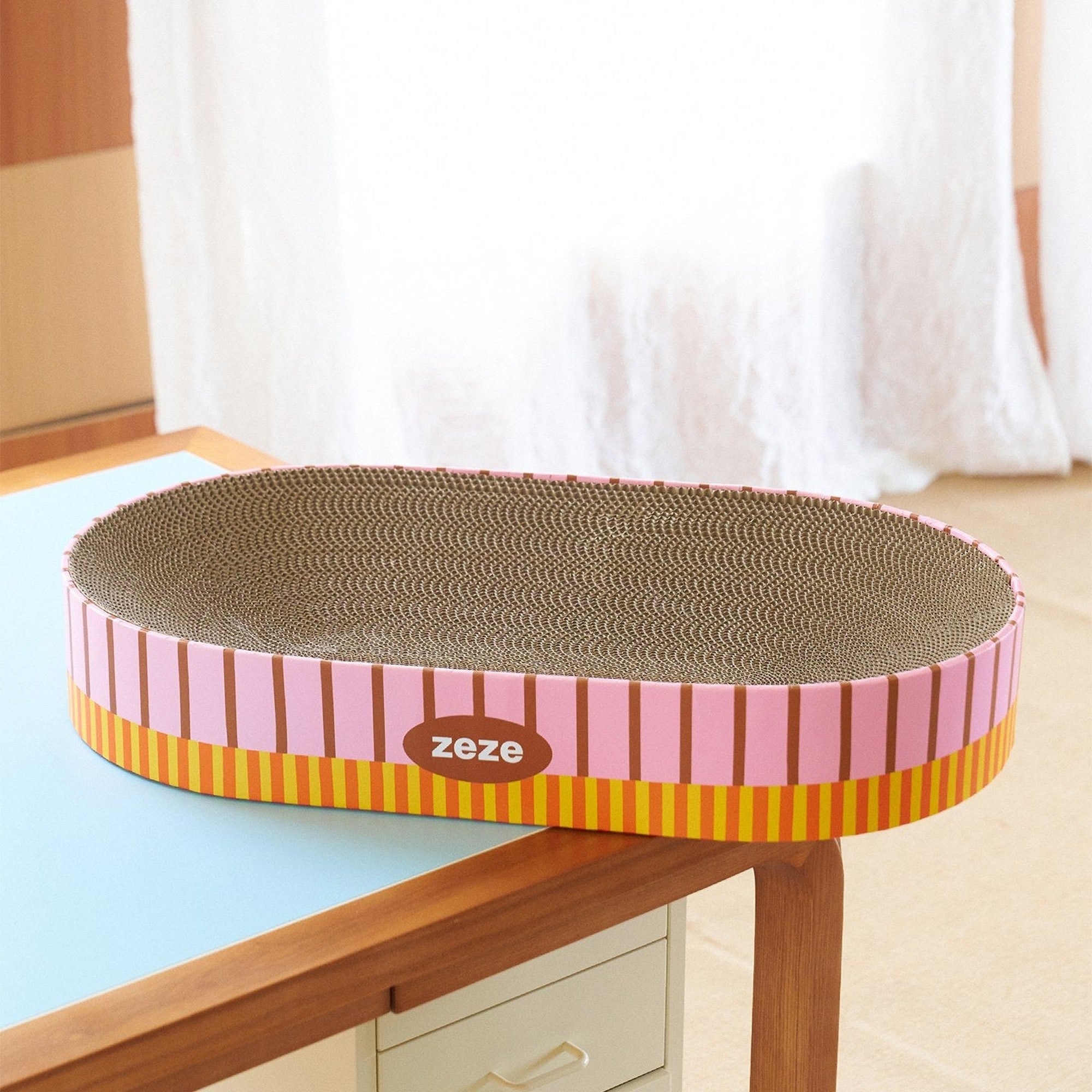 Oval scratcher on a desk