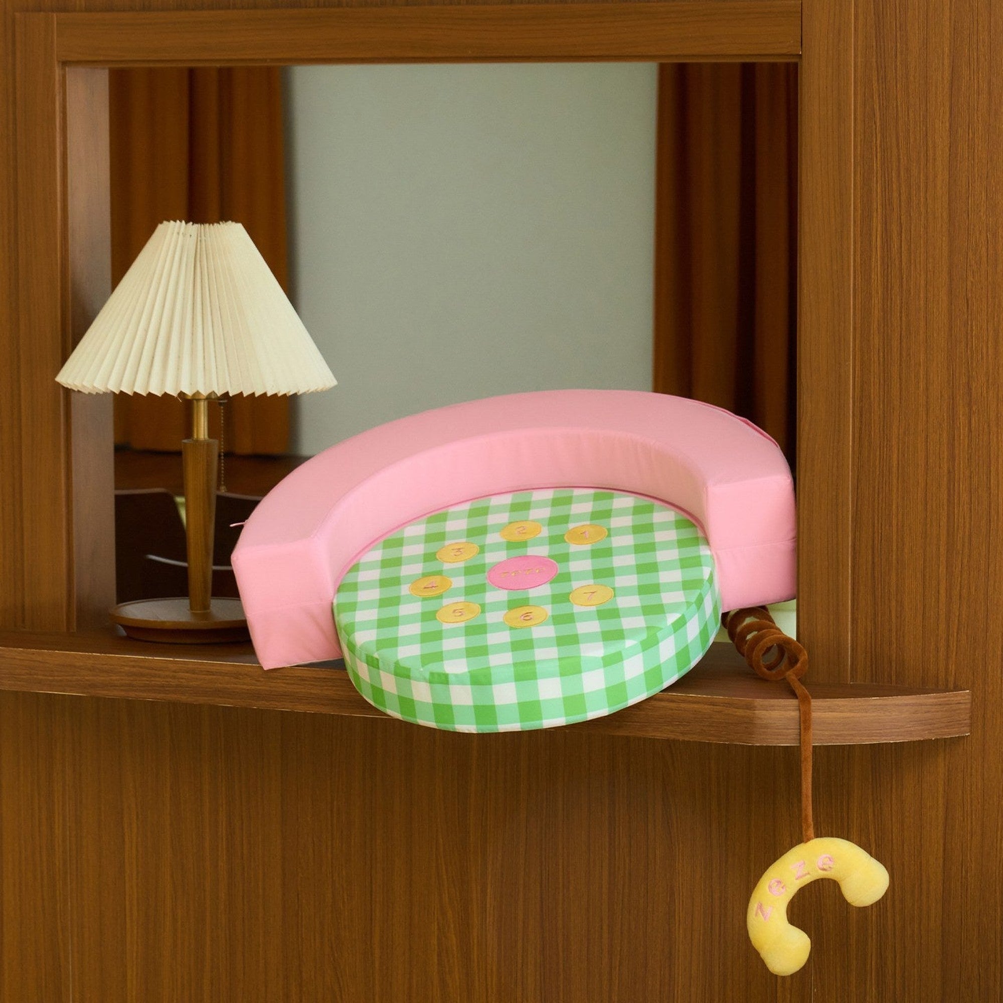 Retro Telephone pet sofa on a shelf with lamp