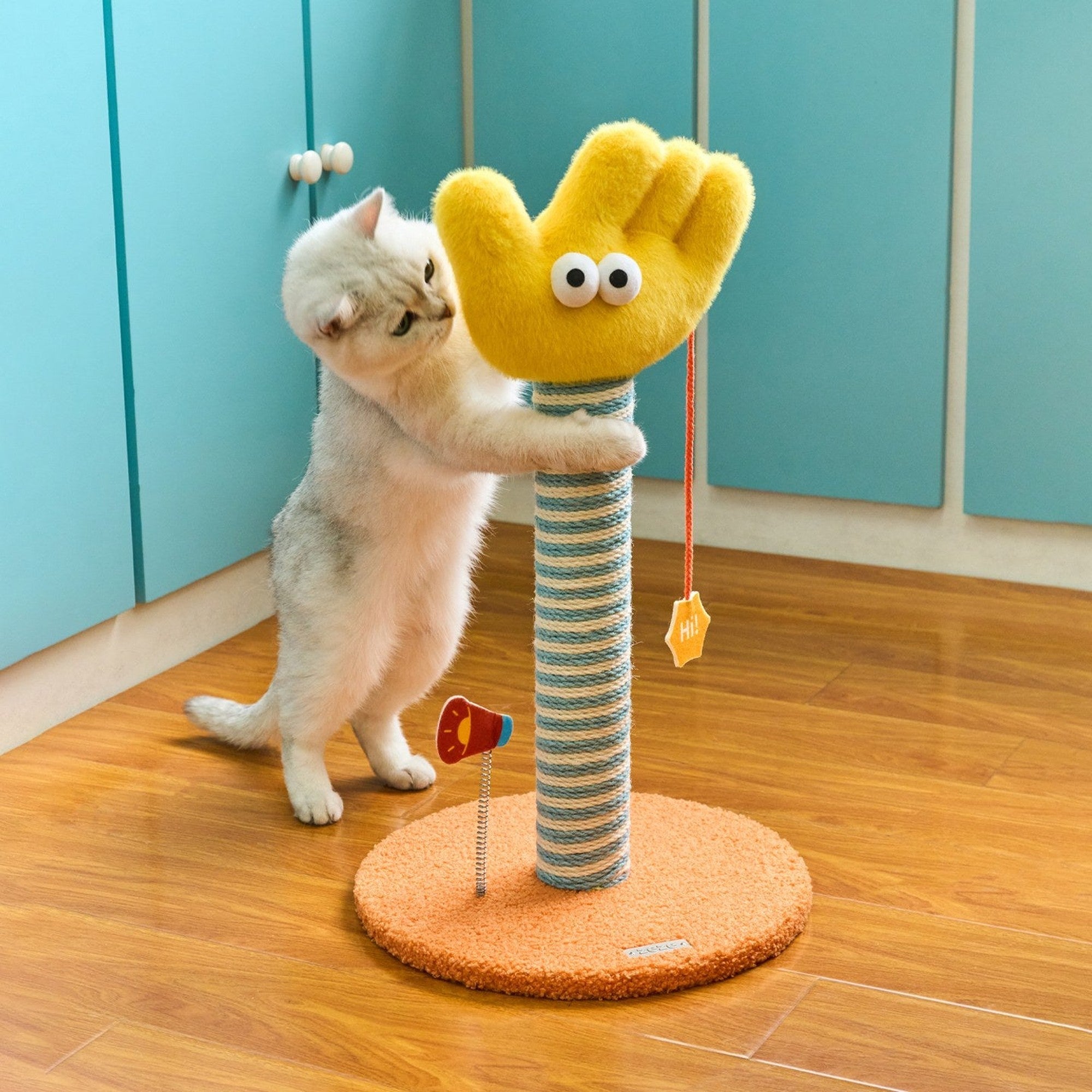 Cat hugging the ZEZE Say Hi waving hand cat scratching post