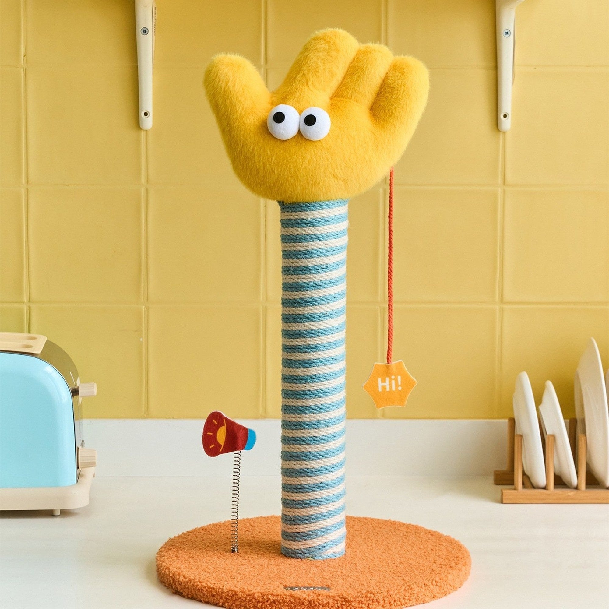 ZEZE Say Hi waving hand scratching post on a kitchen counter