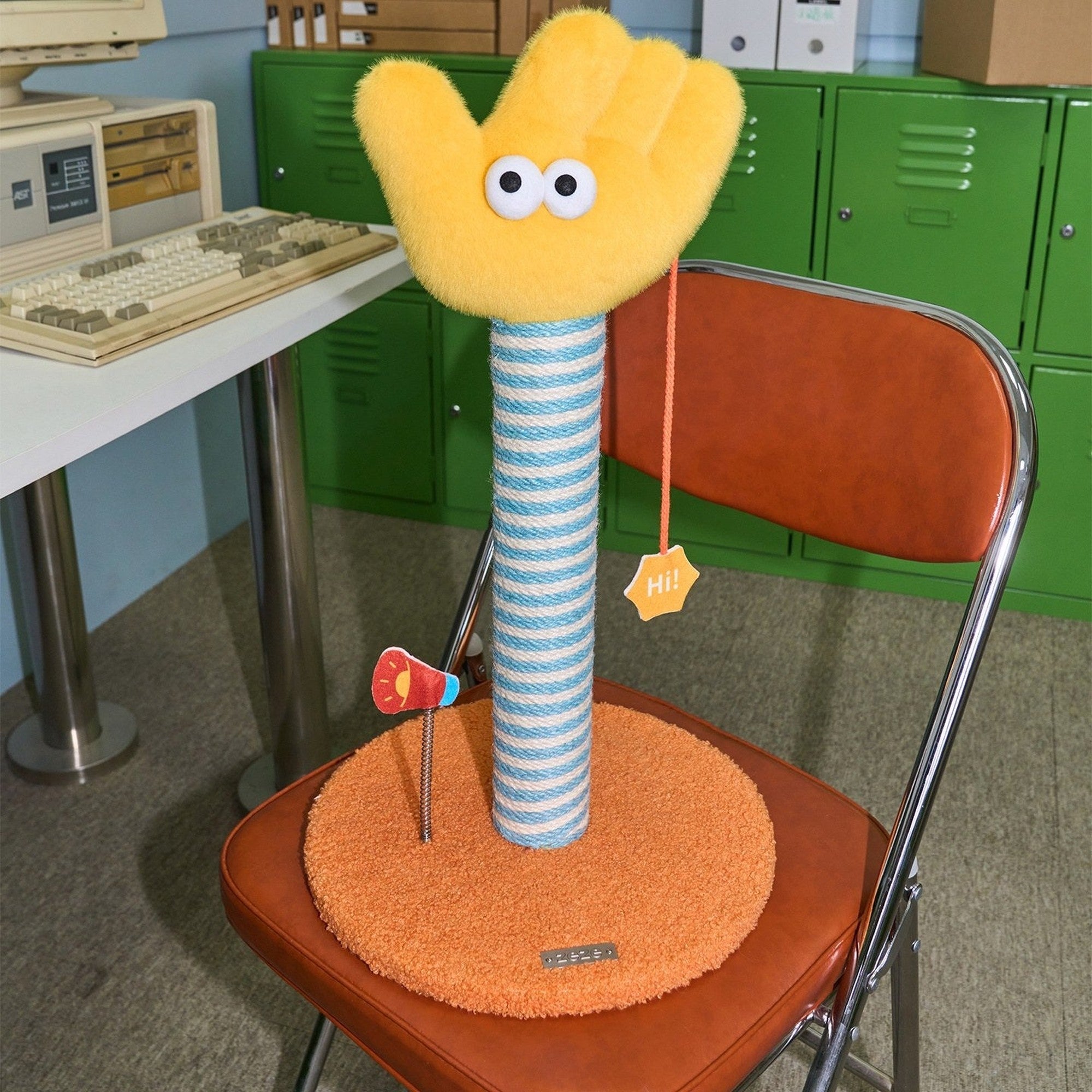 Say Hi scratching post on a chair in an office